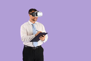 Wall Mural - Young businessman with clipboard using VR glasses on lilac background