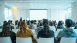 © CK Studio - People being trained, looking at big screen in auditorium