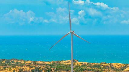 Wall Mural - panoramic view of wind farm or wind park, with high wind turbines for generation electricity with co