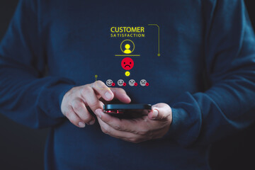 Poster - Man use a mobile phone give angry emotion face on virtual screen for feedback review satisfaction service opinion and testimonial on application. Online customer review satisfaction feedback survey.