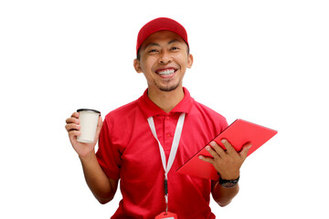 Asian Delivery man is holding a cup of morning coffee in one hand and a tablet in the other, preparing to start his work day. Isolated on a white background.