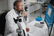 © peopleimages.com - Science, lab and virus research with black man and computer for microscope data analysis and report. Working, scientist and medical journal with technology and professional with monkeypox study