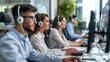 © kimly - Concentrated call center team solving customer problem with urgency.