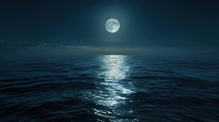 The moon reflecting on a calm ocean at night.