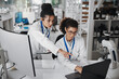 © CoetzeeRising/peopleimages.com - Women, technology and research in laboratory for teamwork, analysis and innovation or experiment. Collaboration, point and science in hospital for support, advice or career in medical or health care