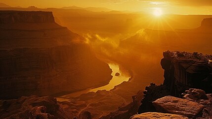 Poster - The magic of a sunrise over a canyon, with the sun's rays gradually lighting up the rock formations, showcases grandeur.