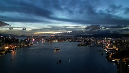 Wall Mural - June 28 2024 a landscape of Dramatic Hong Kong Harbor Sunset