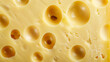 © Евгений Архипов - Close-up of a piece of Swiss cheese with holes