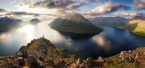 Wall Mural - Superb sunset view from populat tourist attraction - Klakkur peak, Faroe Islands, Denmark, Europe. Unbelievable evening scene of Kalsoy island.