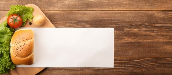 Poster - Top view of a wooden table background with a fresh homemade sandwich on a blank white paper, offering ample copy space image.
