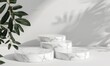 © Olexiy Vasilyuk - Background podium product display 3D stand platform white marble stone. Product podium background stage cosmetic pastel shadow pedestal mockup render empty beauty floor minimal studio
