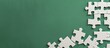 © vxnaghiyev - Incomplete white cardboard puzzle on green background with one wrong piece, a missing piece and room for text, symbolizing team building, part missing, seeking replacement. with copy space image