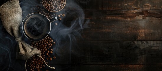 Leinwandbilder - A cup of coffee and burlap sack of beans with smoke on wooden background, with space for text. with copy space image. Place for adding text or design