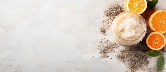 Poster - Natural body care banner featuring a body scrub with orange and sea salt, arranged in a flat lay with copy space image.