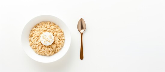 Aufkleber - Top-down view of a plate of oatmeal with a spoon, portraying a diet concept featuring organic and fitness food for breakfast, set on a white table with copy space image.