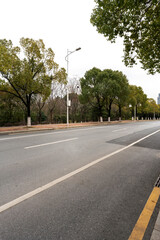 Wall Mural - Empty urban road and buildings in the city