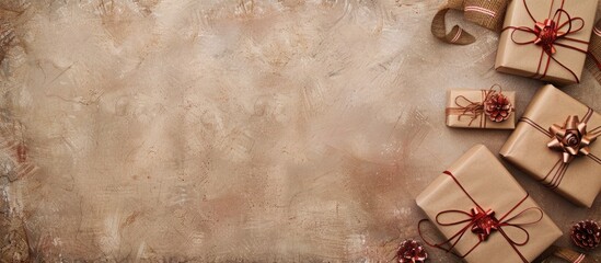 Fototapete - Border of decorative gifts wrapped in kraft paper and tied with ribbon, suitable for Christmas, Valentine's Day, birthdays, or any occasion in need of a festive copy space image.