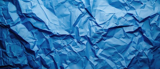 Aufkleber - Blue crumpled paper with copy space image.
