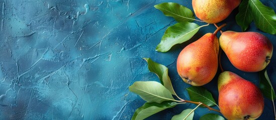 Canvas Print - Fresh pears and leaves displayed on a vibrant blue backdrop with space for additional images.