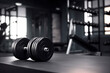 © Rafa Fernandez - Single dumbbell on gym floor in sunlight...