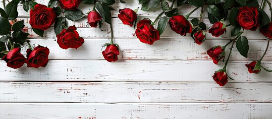 Sticker - Close-up of textured red roses on a white wooden background for Women's Day or Mother's Day occasions with copy space image.