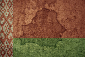 Wall Mural - map and flag of belarus on a old vintage crack paper background .