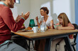 © bernardbodo - Family enjoying breakfast in the dining room