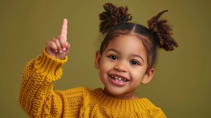 Wall Mural - The smiling child in yellow sweater