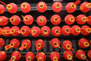 Red Chinese lanterns in a pagoda. China.