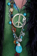 Sticker - Woman with peace and love pendentif. Detail.  Domancy.  France.