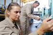 © auremar - a factory woman and man
