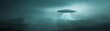 © Aris Suwanmalee - A mysterious UFO hovers in a foggy sky, casting a beam of light.