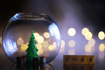 Wall Mural - Decorated christmas tree pine on blurred gold background bokeh light banner.