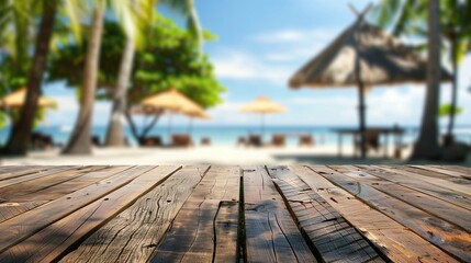 Wall Mural - Empty wooden table with tropical beach on blurred background, ocean view, space for text