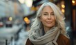 © Picture Perfect - Attractive smiling white haired mature woman posing in a city street looking at the camera, Generative AI