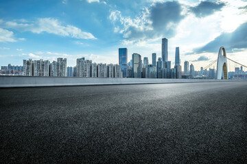 Empty asphalt road and cityscape in modern city