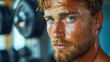 © Kakabe - Close-up of a sweaty man with intense blue eyes in a gym setting, emphasizing dedication and hard work.