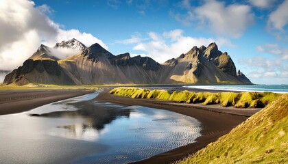 Wall Mural - mountains water and black sand in iceland