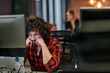© .shock - Disappointed Programmer with Messy Hair Looking at Computer Monitor in Office.