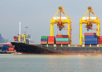 Logistics and transportation of Container Cargo ship and Cargo plane with working crane bridge in shipyard at sunrise, logistic import export and transport industry background