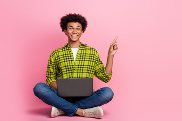 Wall Mural - Full size photo of nice young man laptop point finger empty space wear shirt isolated on pink color background