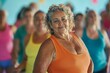 © Elmira - A group of middle-aged women participate in a lively dance class, smiling and moving with energy