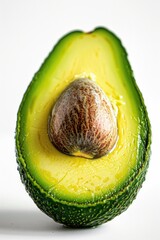 Poster - Fresh avocado cut in half on a white background