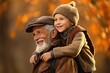 © Al - Father's Day. A man hugs his son. Autumn. Family. Grandfather. Grandson. Generations. child on the shoulders