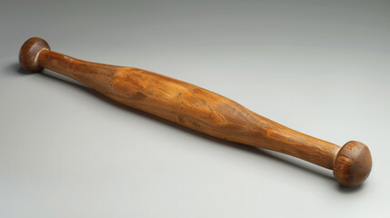 A tool used for flattening dough or pastry. It is a long, cylindrical object with a handle at each end.