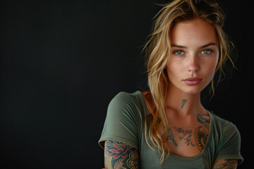 Wall Mural - Caucasian woman with tattoo on black background.