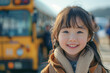 © S photographer - Asian girl travels to school on a school bus.