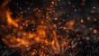 © Sirichat. Camphol - Photograph of embers of fire particles on a black background. sparkle background Abandoning the gleam of the dark fire particles The bonfire in the picture is blurred from movement.
