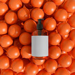 © Pepino de Mar studio/Stocksy - Soap dispenser on orange spheres