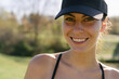© Lea Jones/Stocksy - portrait of young woman  playing golf in the morning sun